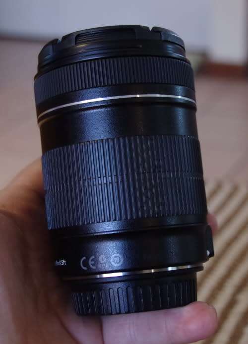 Canon 18-135 IS photos show exact item on sale, excellent condition.