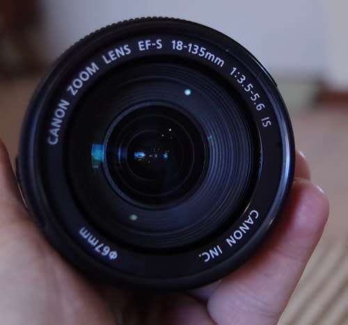 Canon 18-135 IS photos show exact item on sale, excellent condition.