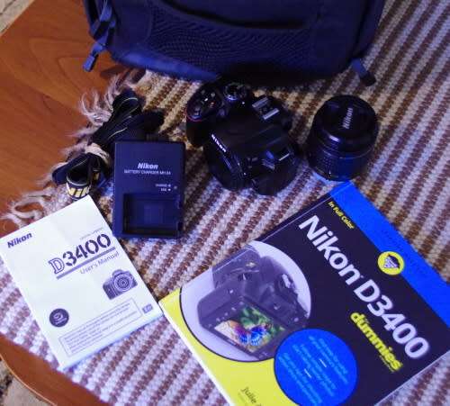 Nikon D3400 with 18-55 VR ii lens, photos show exact kit on sale.