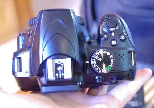 Nikon D3400 with 18-55 VR ii lens, photos show exact kit on sale.