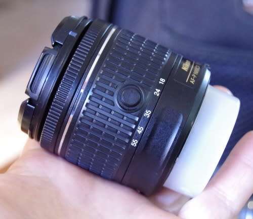 Nikon D3400 with 18-55 VR ii lens, photos show exact kit on sale.