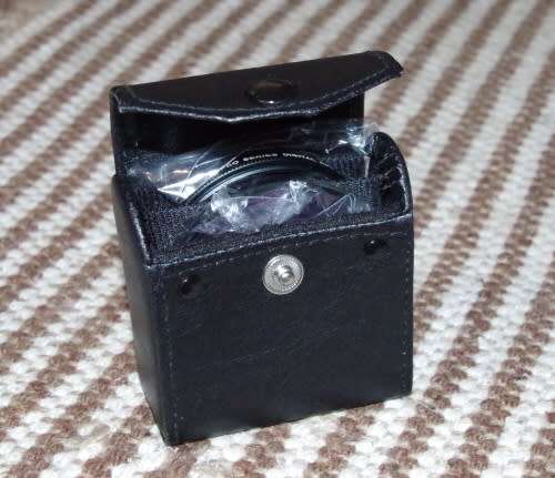 set of 3 58 mm Filters with a case, spotless like new. photos show exact items on sale