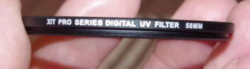 set of 3 58 mm Filters with a case, spotless like new. photos show exact items on sale