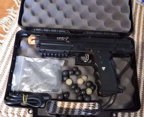 Tippmann TipX paintball marker, photos show exact item on sale. been in storage, not used much.