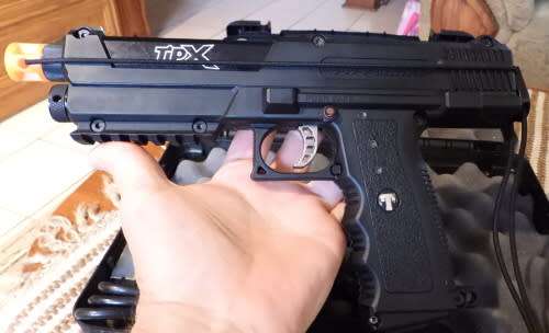 Tippmann TipX paintball marker, photos show exact item on sale. been in storage, not used much.