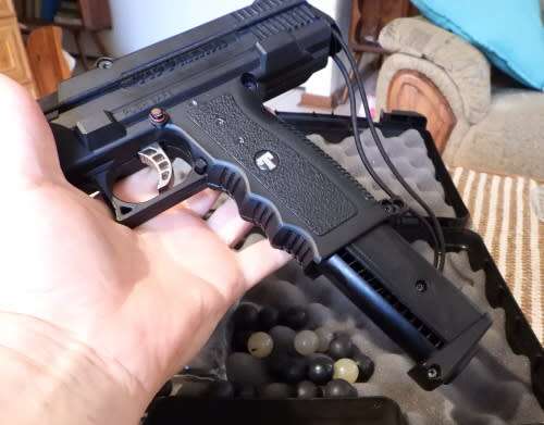 Tippmann TipX paintball marker, photos show exact item on sale. been in storage, not used much.