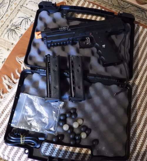 Tippmann TipX paintball marker, photos show exact item on sale. been in storage, not used much.