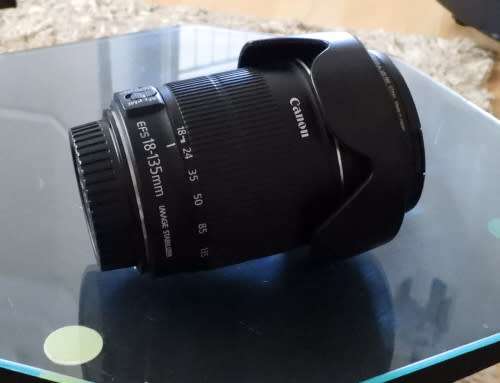Canon 18-135 IS lens, photos show exact item on sale, excellent condition inside and out.