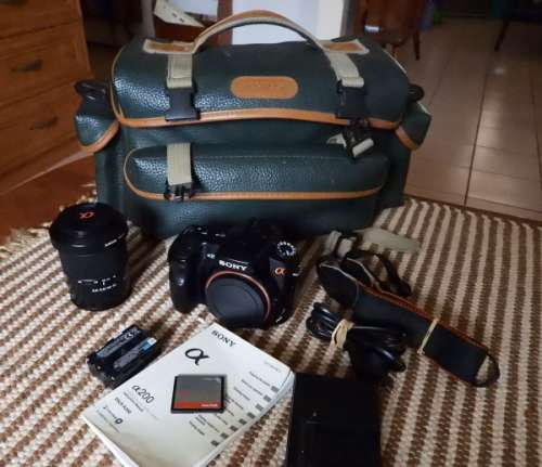 Sony A200 body with 18-70 lens, photos show exact item on sale, excellent condition.