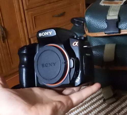 Sony A200 body with 18-70 lens, photos show exact item on sale, excellent condition.