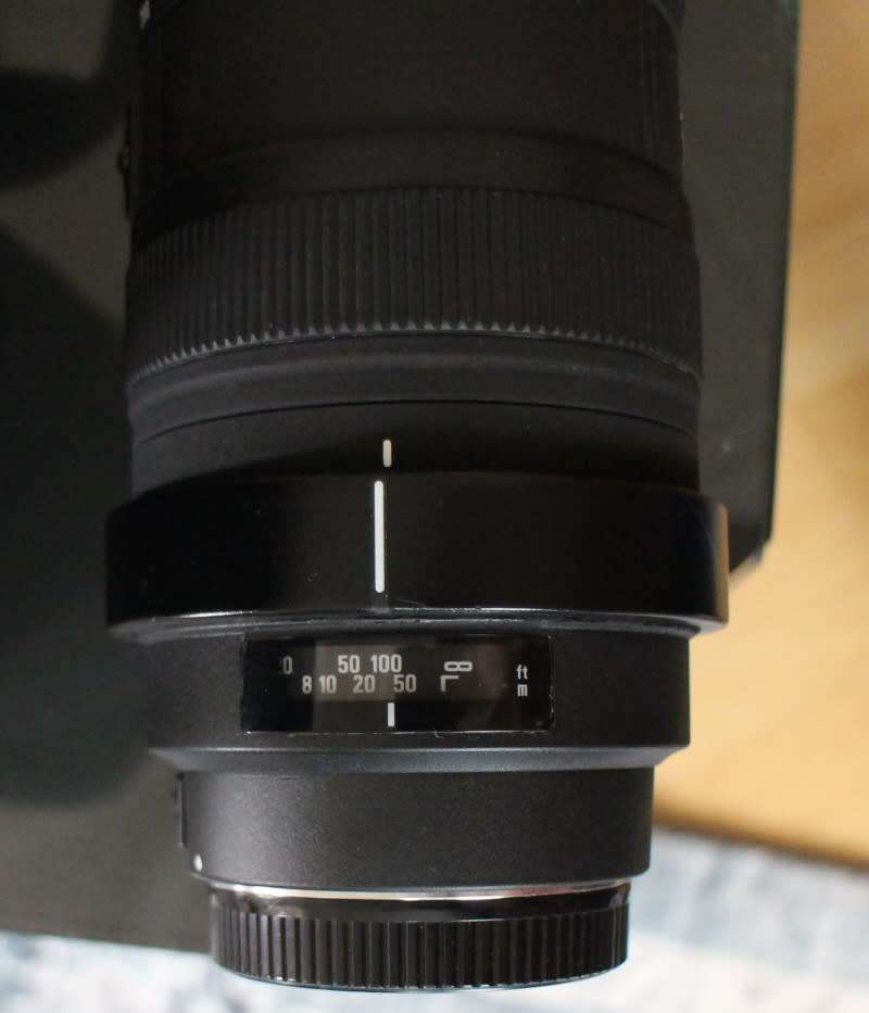 Sigma for Canon 50-500, photos show exact item on sale, has some signs of use but works perfectly.