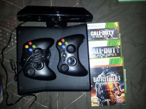 X Box 360 With kinect 2 remotes and games