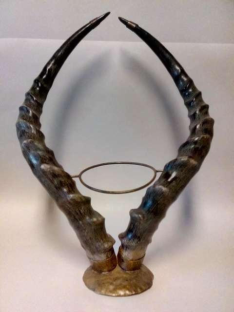 STUNNING COLLECTORS IMPALA HORNS ON BRASS STAND