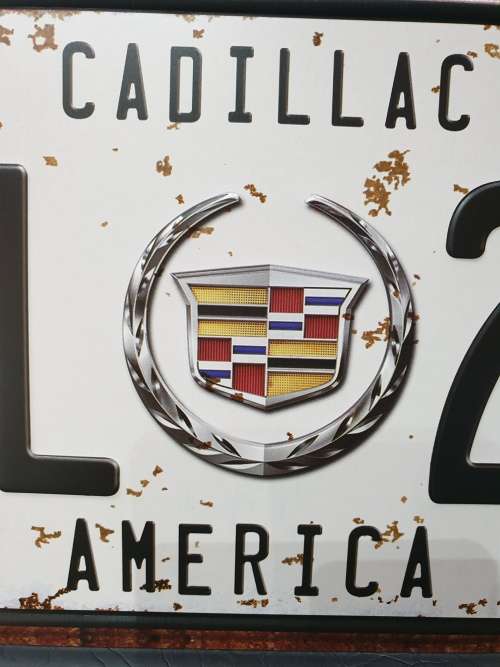 VINTAGE STYLE PRESSED METAL CADILLAC NUMBER PLATE SIGN