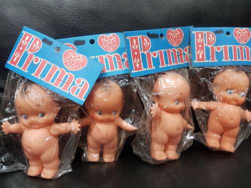 FOUR PRIMA KEWPIE DOLLS IN ORIGINAL PACKAGING (ALL FOR ONE BID)