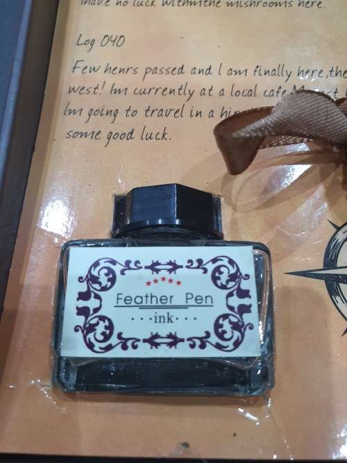 HIGHLY COLLECTABLE INK FEATHER PEN...UNUSED CONDITION