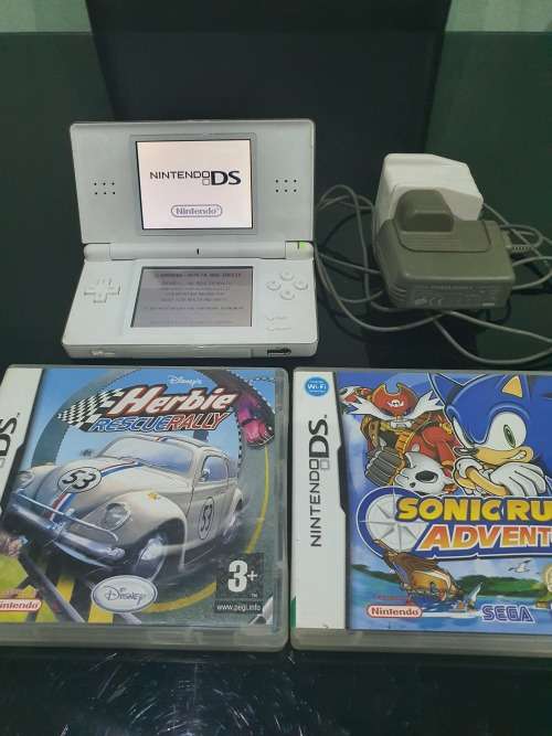 NINTENDO  DS LITE..ND TWO GAMES...HAND HELD