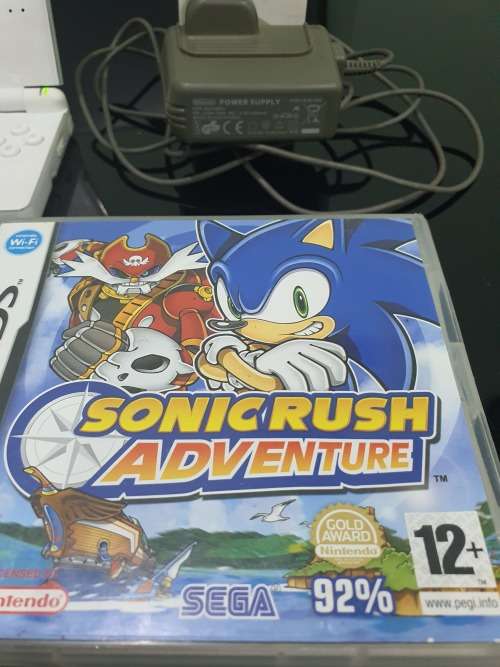 NINTENDO  DS LITE..ND TWO GAMES...HAND HELD