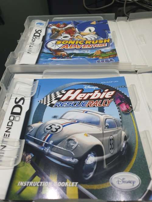 NINTENDO  DS LITE..ND TWO GAMES...HAND HELD