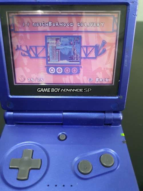 NINTENDO GAMEBOY ADVANCE SP WITH 5 CARTRIDGES..WORKING ORDER