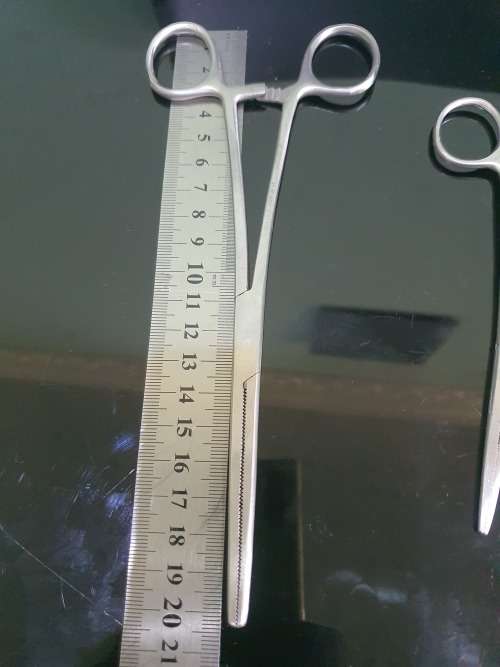 FOUR SERGICAL SCISSORS AND ONE TWEEZER...ALL FOR ONE BID