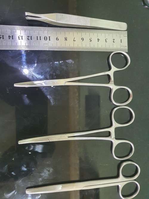 FOUR SERGICAL SCISSORS AND ONE TWEEZER...ALL FOR ONE BID