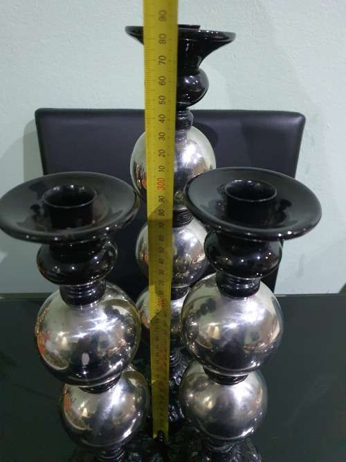 THREE STUNNING DESIGNER CANDLE HOLDERS WITH SOLID CAST IRON STAND