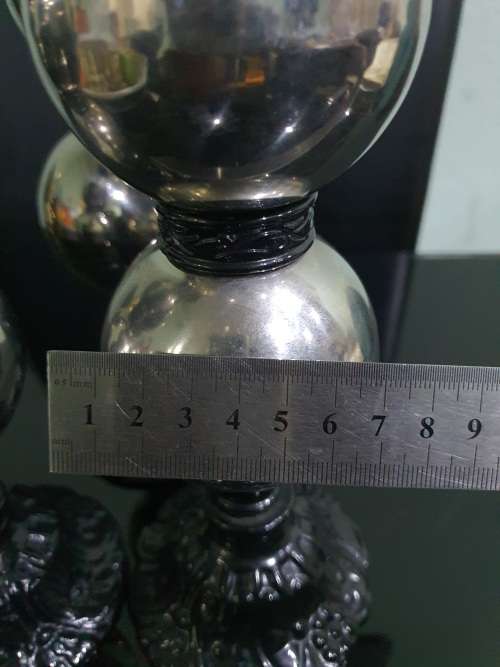 THREE STUNNING DESIGNER CANDLE HOLDERS WITH SOLID CAST IRON STAND