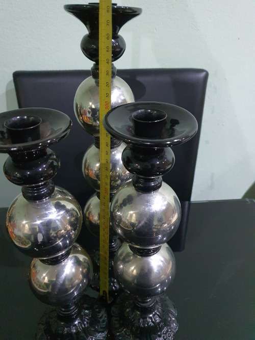 THREE STUNNING DESIGNER CANDLE HOLDERS WITH SOLID CAST IRON STAND