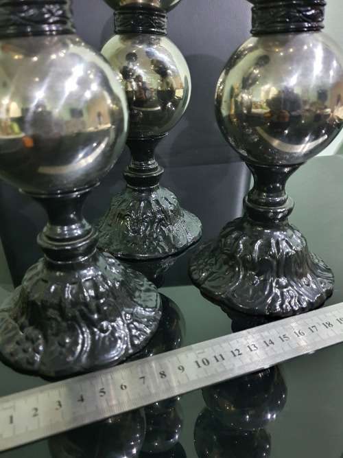 THREE STUNNING DESIGNER CANDLE HOLDERS WITH SOLID CAST IRON STAND