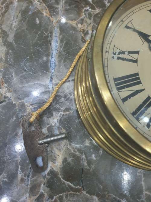 VINTAGE SHIPS CLOCK....SOLID BRASS...WORKING ORDER