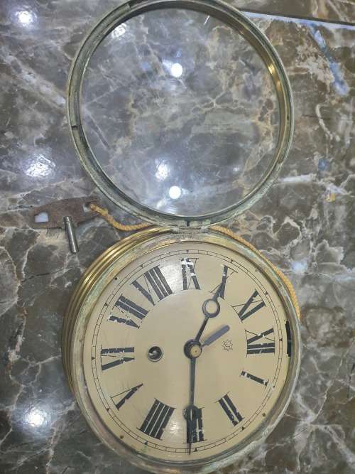 VINTAGE SHIPS CLOCK....SOLID BRASS...WORKING ORDER
