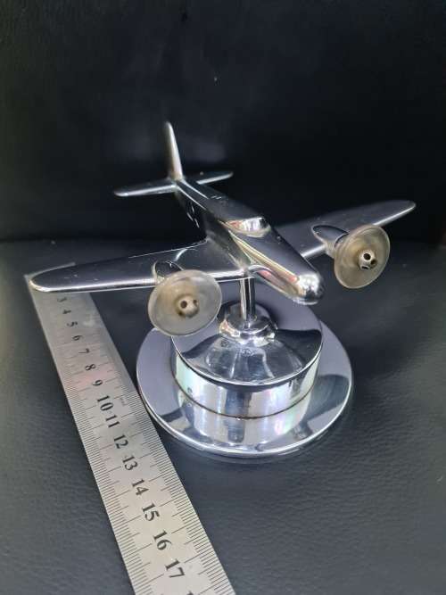 STUNNING SOLID METAL AIRPLANE ON SWIVEL STAND
