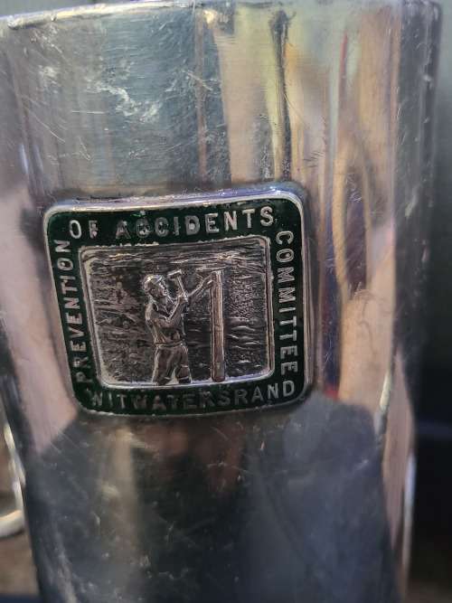 SILVER PLATED COMMEMORATIVE MINING MUG OF WITWATERS RAND (HAS MARKINGS)