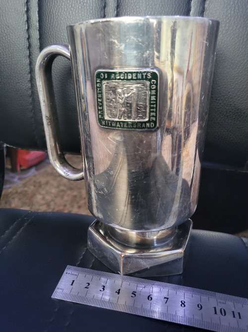 SILVER PLATED COMMEMORATIVE MINING MUG OF WITWATERS RAND (HAS MARKINGS)