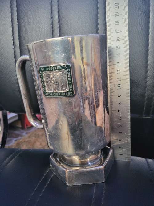 SILVER PLATED COMMEMORATIVE MINING MUG OF WITWATERS RAND (HAS MARKINGS)