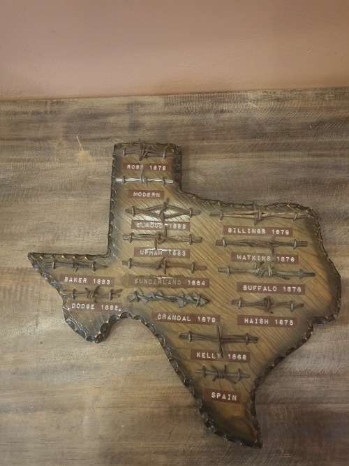 VINTAGE COLLECTORS ITEM BARBED WIRE ON SOLID WOOD