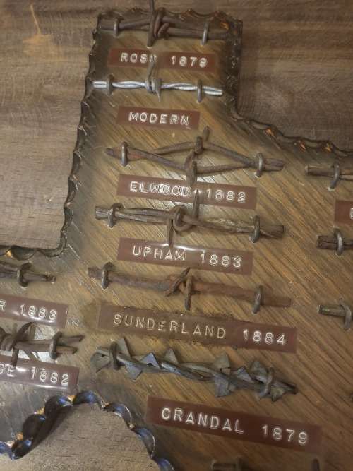 VINTAGE COLLECTORS ITEM BARBED WIRE ON SOLID WOOD
