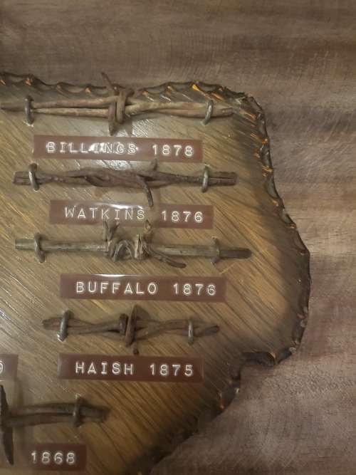 VINTAGE COLLECTORS ITEM BARBED WIRE ON SOLID WOOD