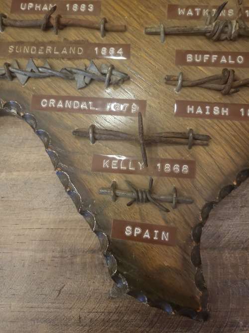 VINTAGE COLLECTORS ITEM BARBED WIRE ON SOLID WOOD