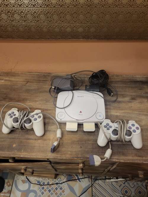 PLAYSTATION 1 WITH POWER SUPPLIES AND 2 X CONTROLLERS (WORKING)