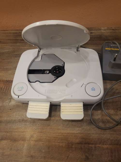 PLAYSTATION 1 WITH POWER SUPPLIES AND 2 X CONTROLLERS (WORKING)