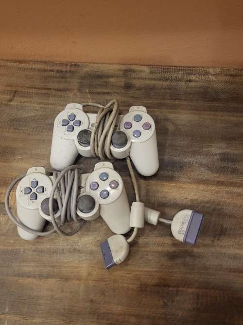 PLAYSTATION 1 WITH POWER SUPPLIES AND 2 X CONTROLLERS (WORKING)