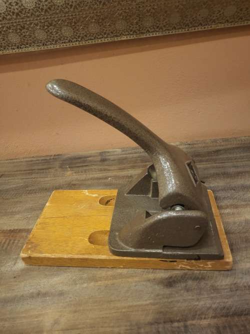 VINTAGE SOLID METAL PUNCH ON WOODEN PLATFORM (GALA MAKE) (WORKING)
