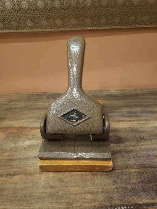 VINTAGE SOLID METAL PUNCH ON WOODEN PLATFORM (GALA MAKE) (WORKING)