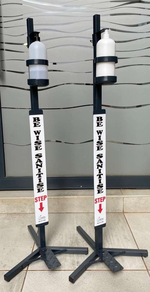 Foot operated sanitiser stand