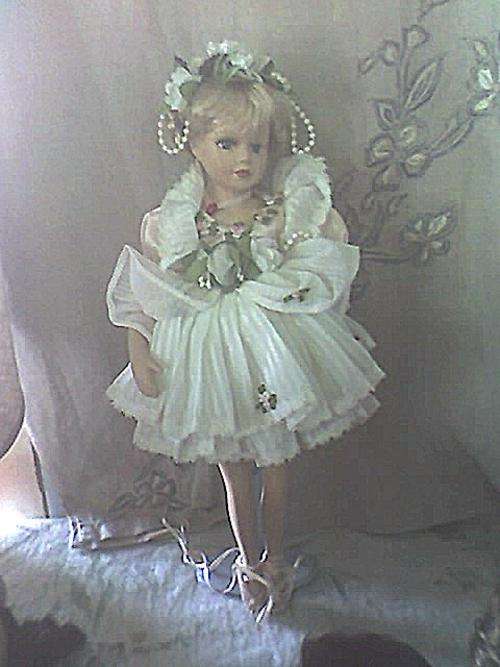 STUNNING PORCELAIN DOLL