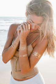 Shimmer Lasts for days Contains sheets of temporary metallic tattoos