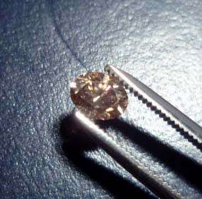 Fancy Brown Diamond , 0.46Ct, SI2,  4.6 x 3.1mm)
