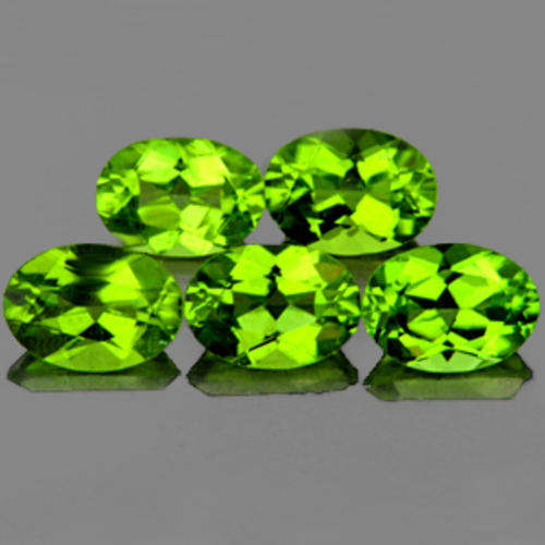 PERIDOT OVAL CUT LOT (7 x  5mm - 5 pc 4.30 TCt)